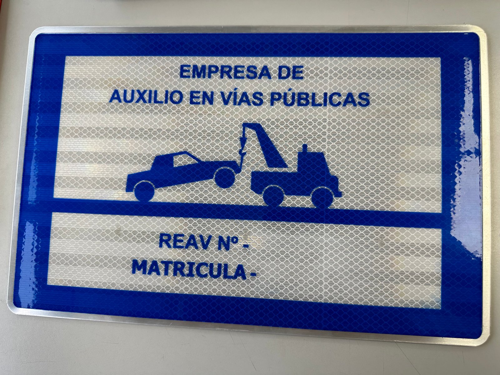 PLACA AUXILIO EN CARRETERA V-24